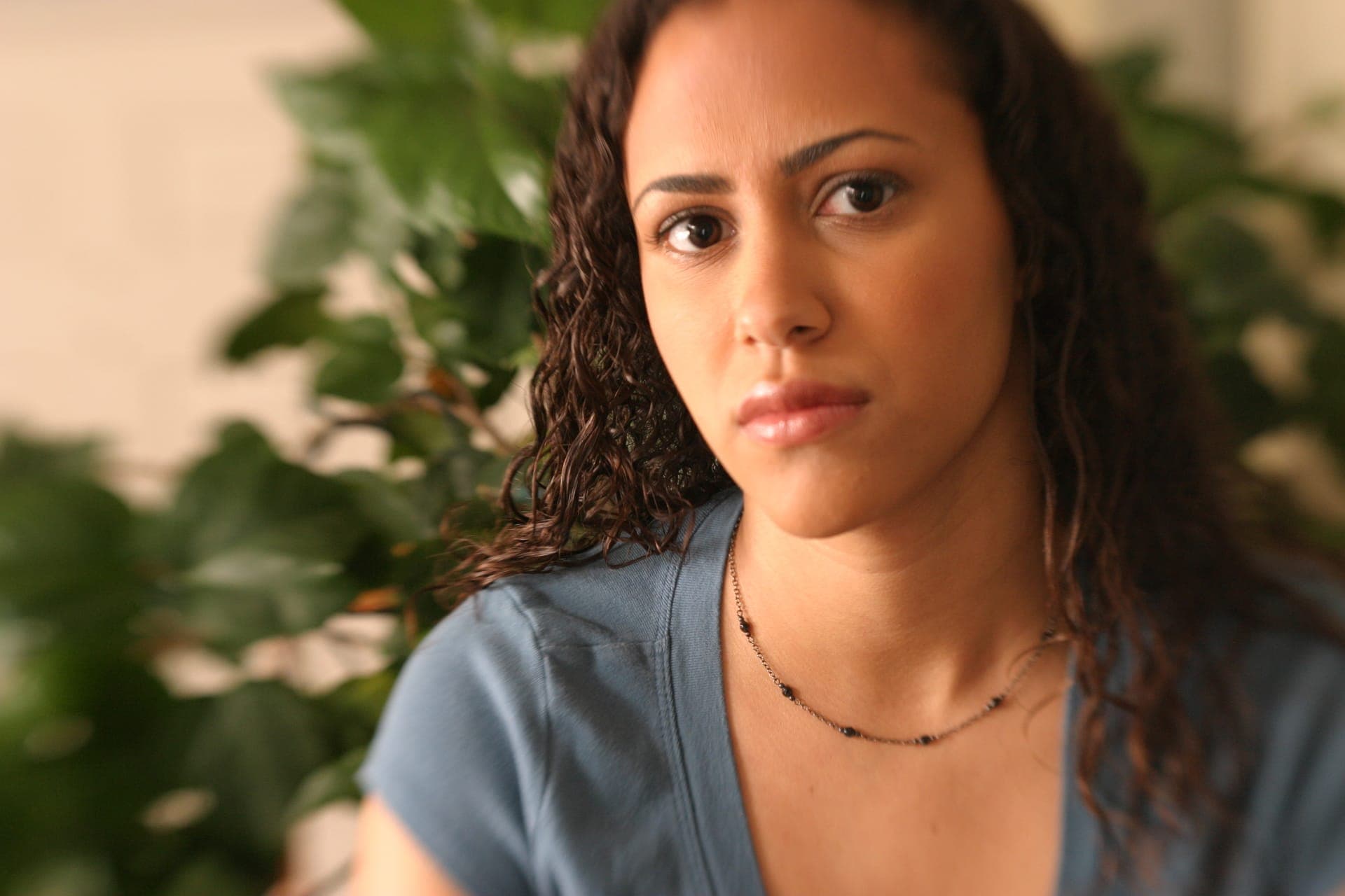 A young woman preparing her questions
